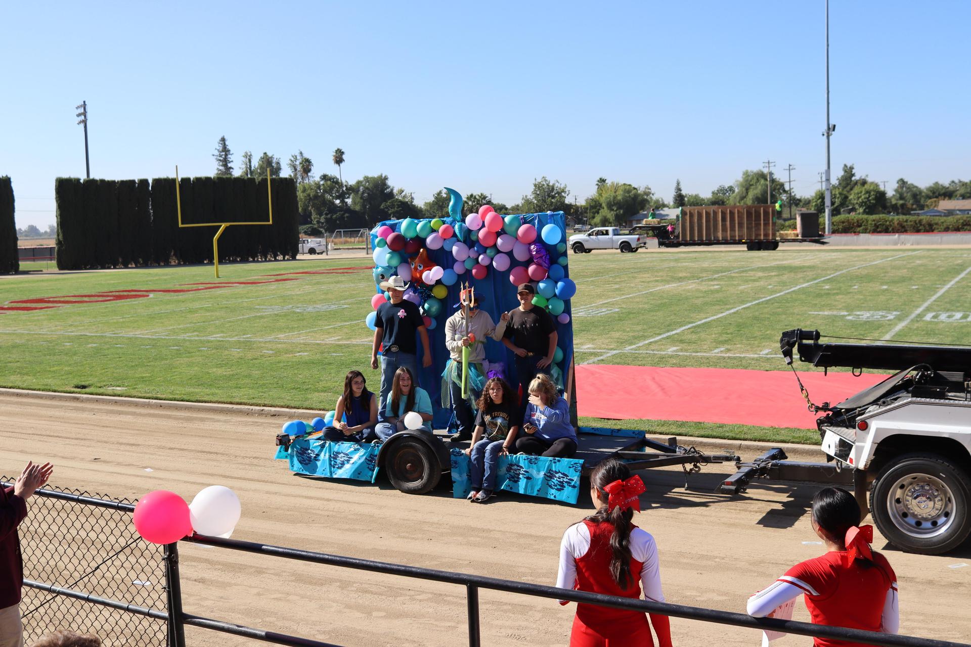 students and staff at the homecoming rally