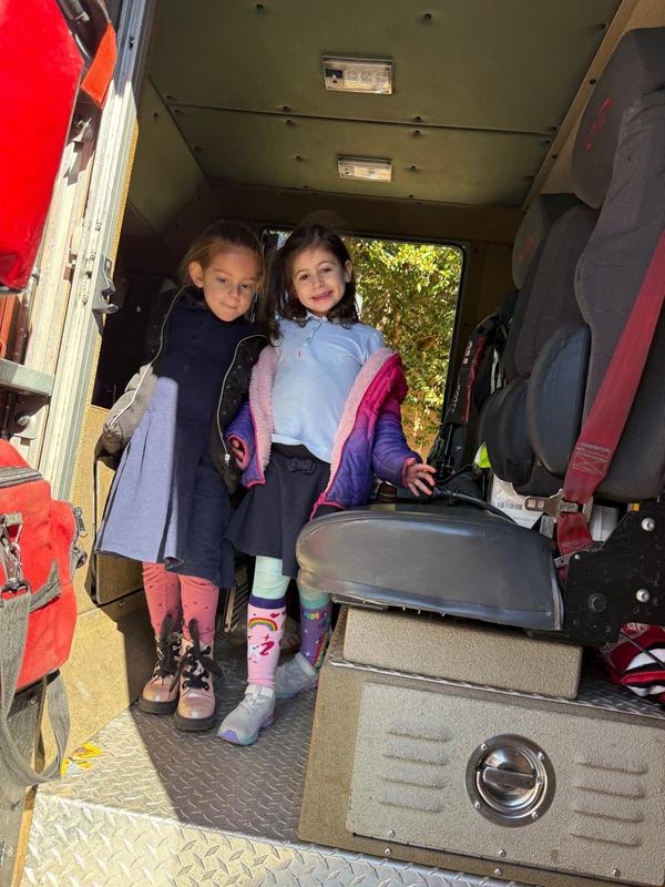 Kindergarten students inside a fire truck