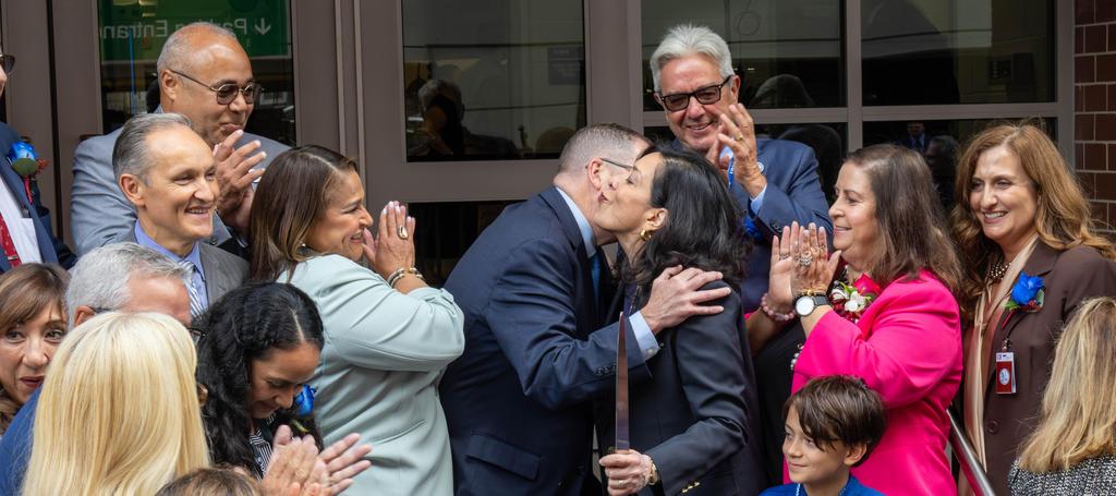 Esther Salas celebrating with the Mayor Brian Stack, Superintendent Silvia Abbato and guests