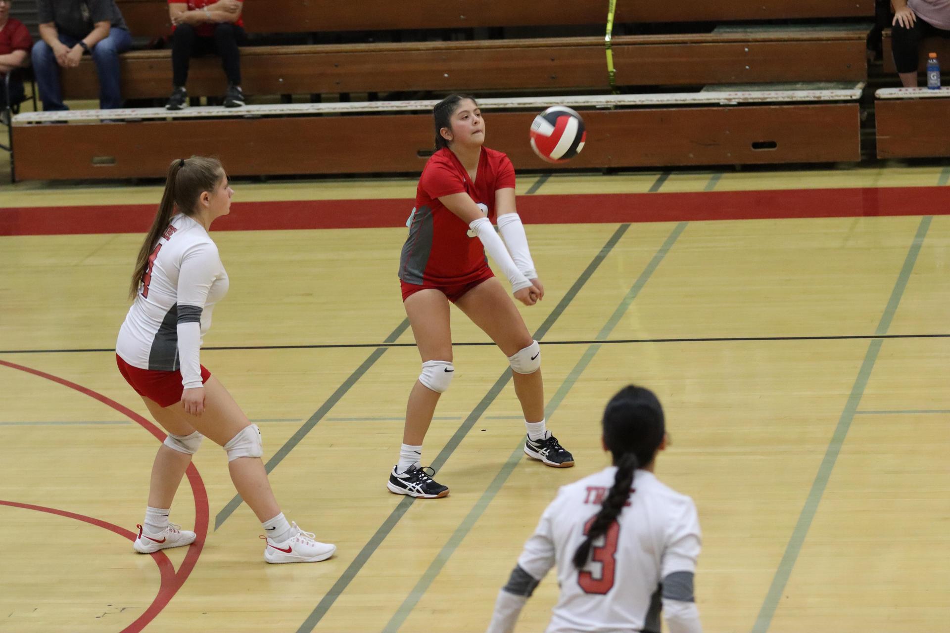 junior varsity girls playing volleyball against Yosemite