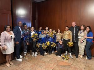 Students taking photo with members of the UFT