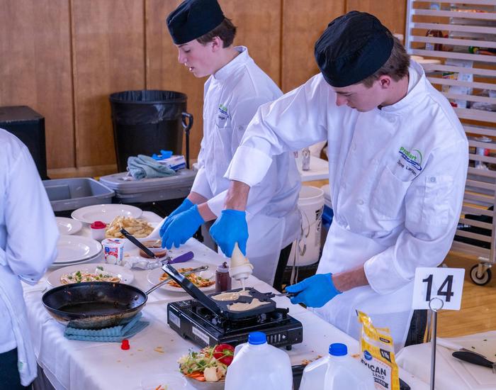 Students participating in cooking competition