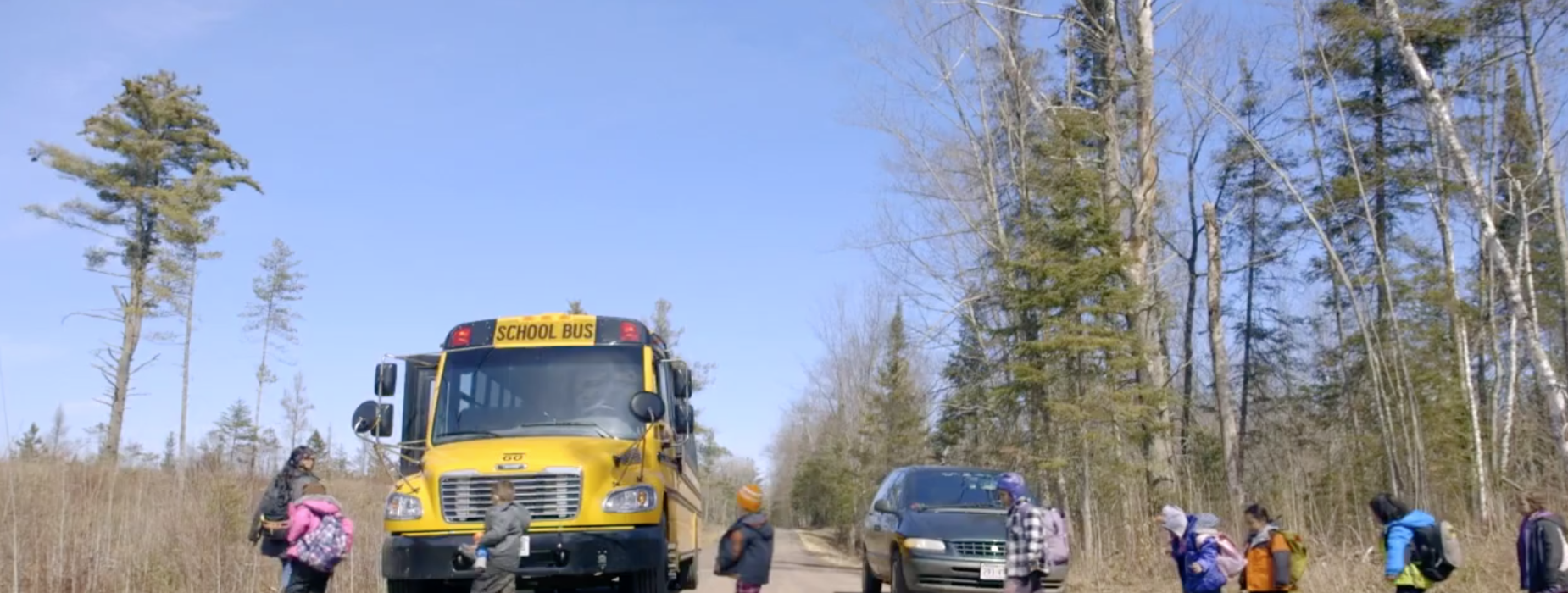 School bus dropping students off.