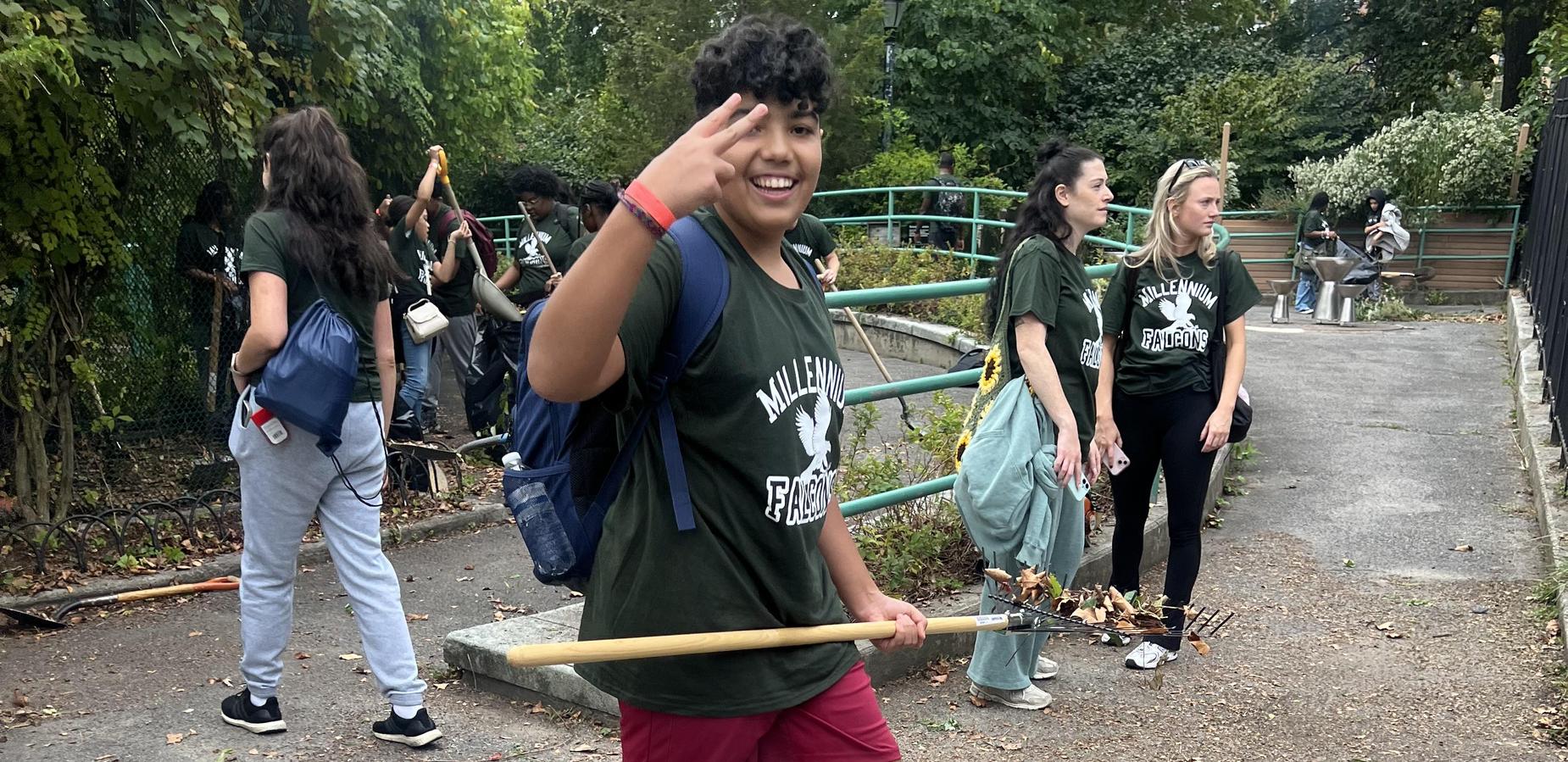 Students cleaning up Pelham Bay Park for community service day.