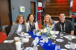 FRSLN attendees pose for a photo during day-one of the conference