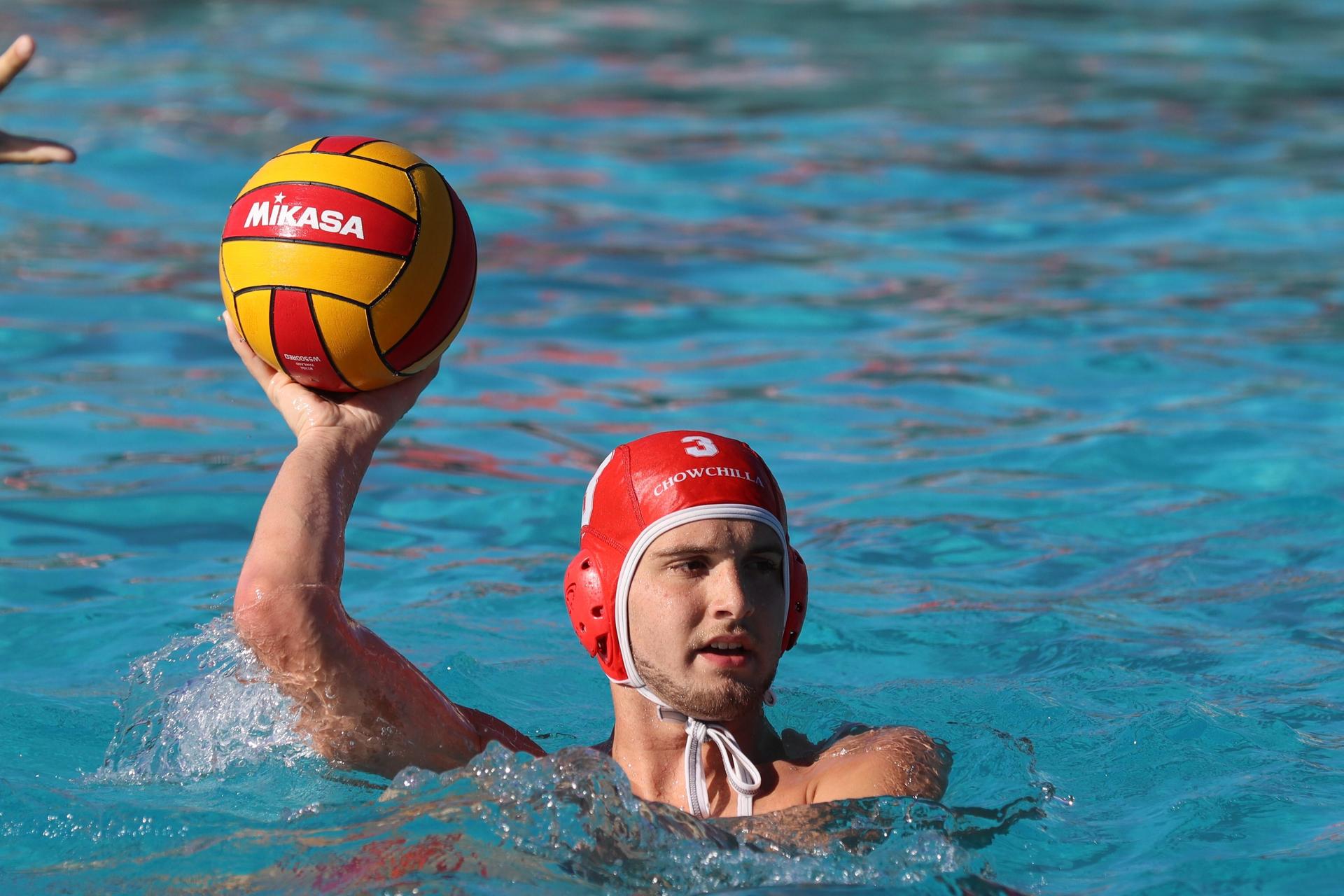 boys playing water polo against Madera