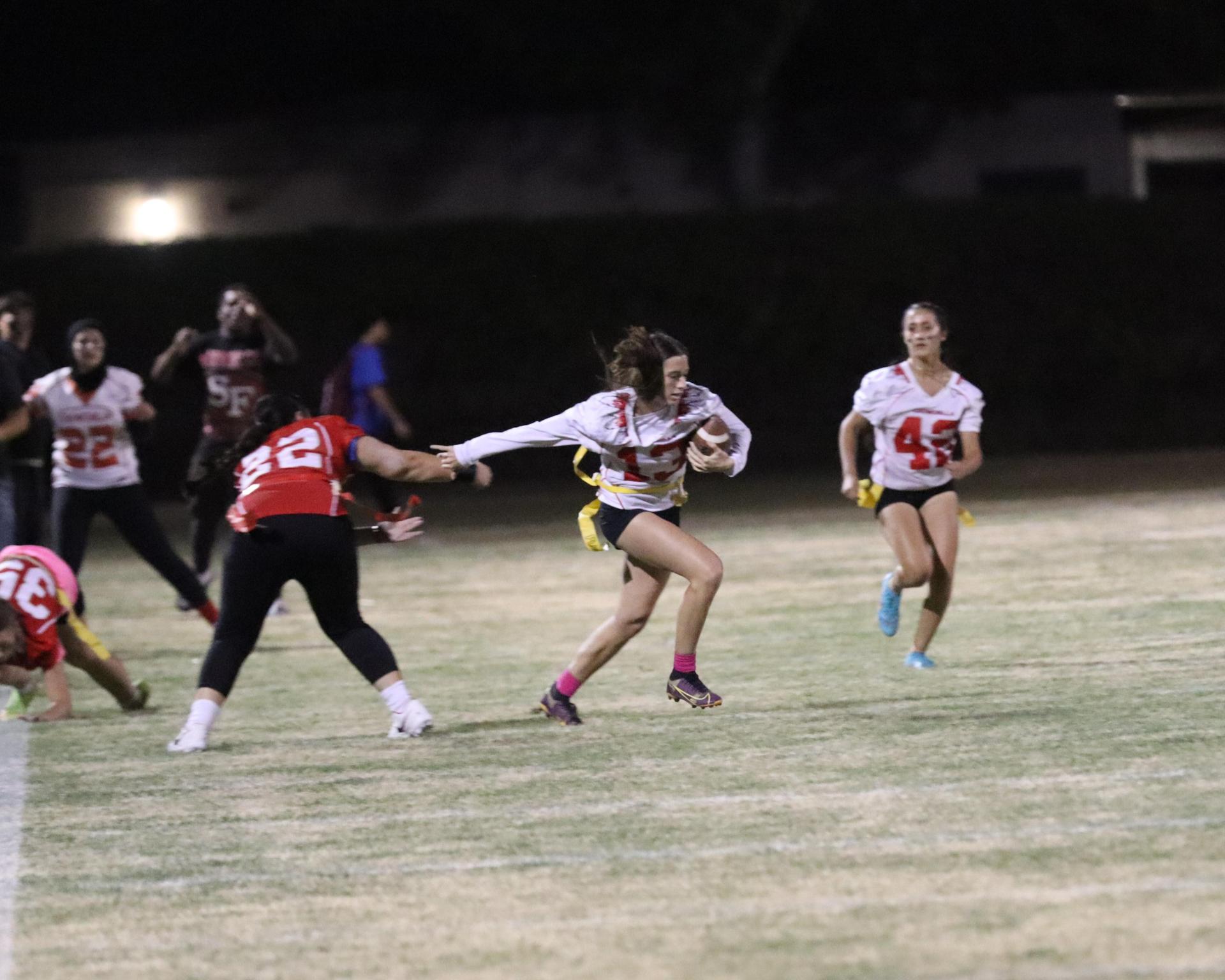 girls playing flag football