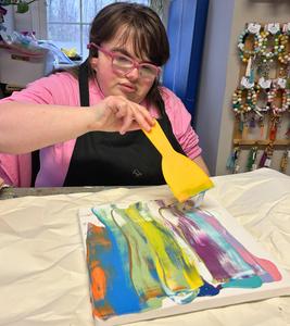 Student painting art project.