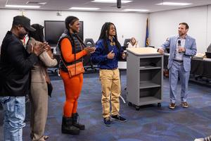 Xaiveyon presented with award by Dr. Willson