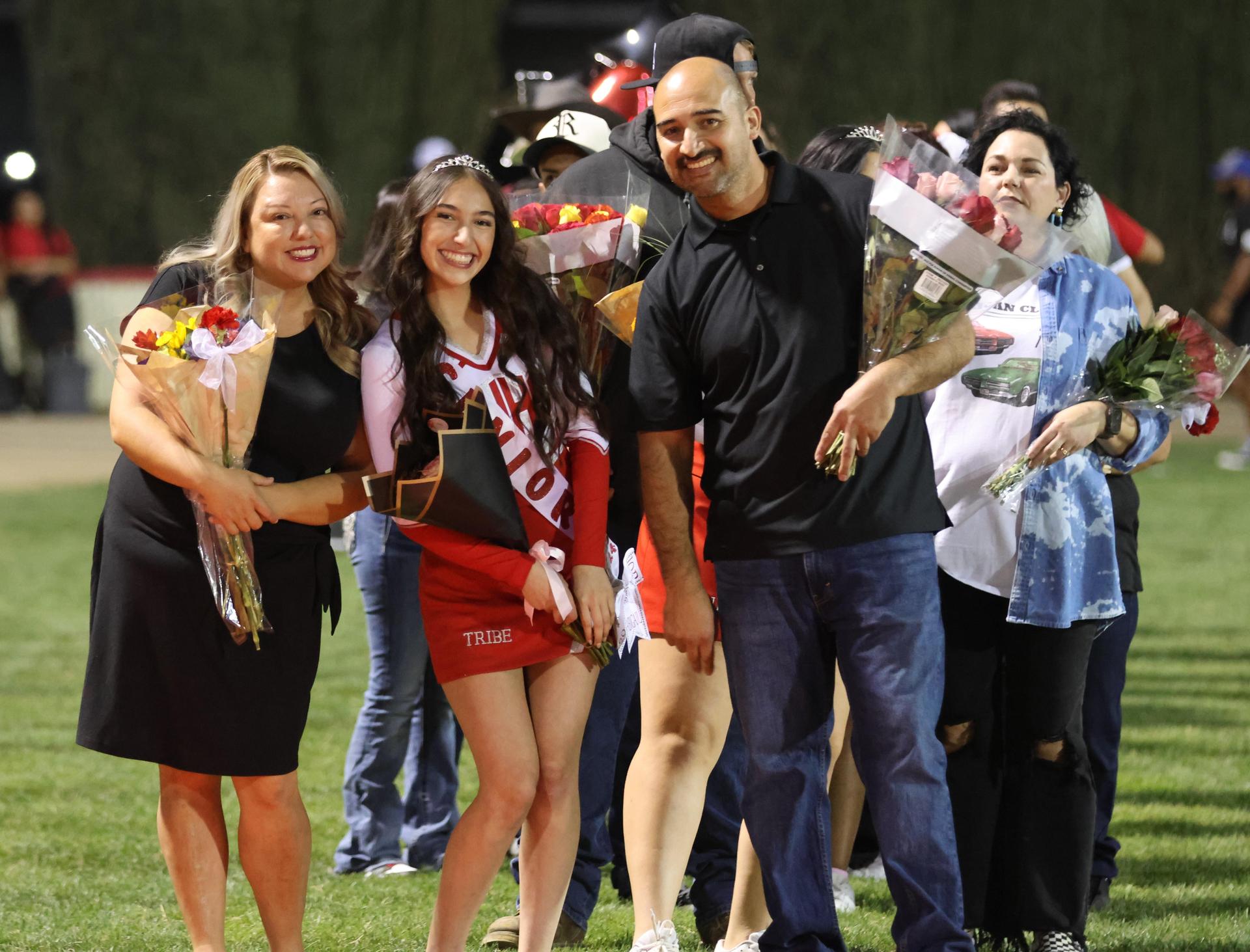 seniors and their escorts celebrating senior night