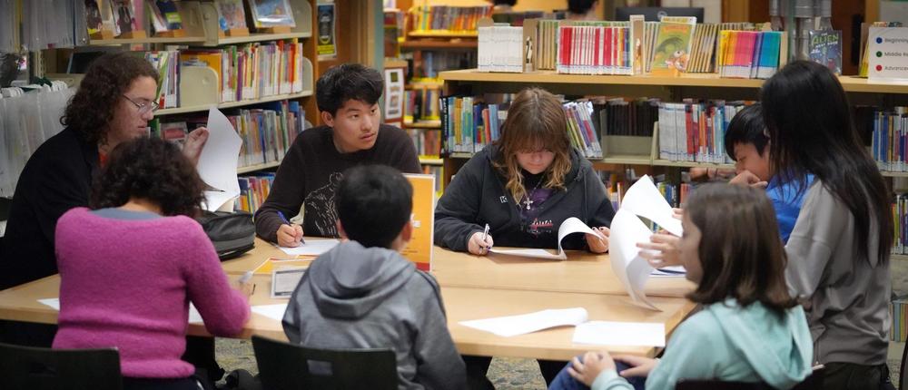 teens around table at library