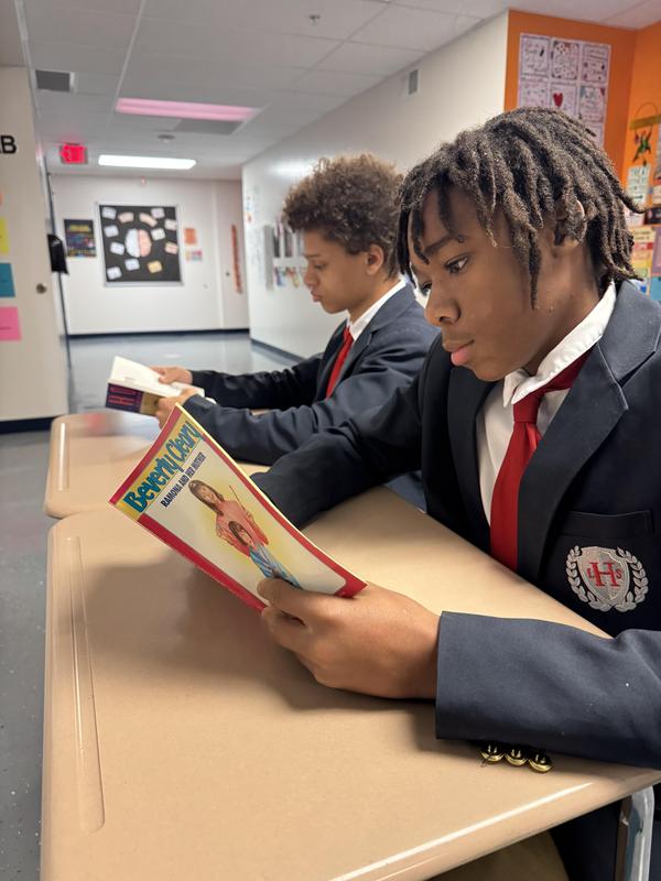 Picture of students reading a book
