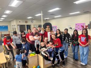 about 10 students pictured during performance in class