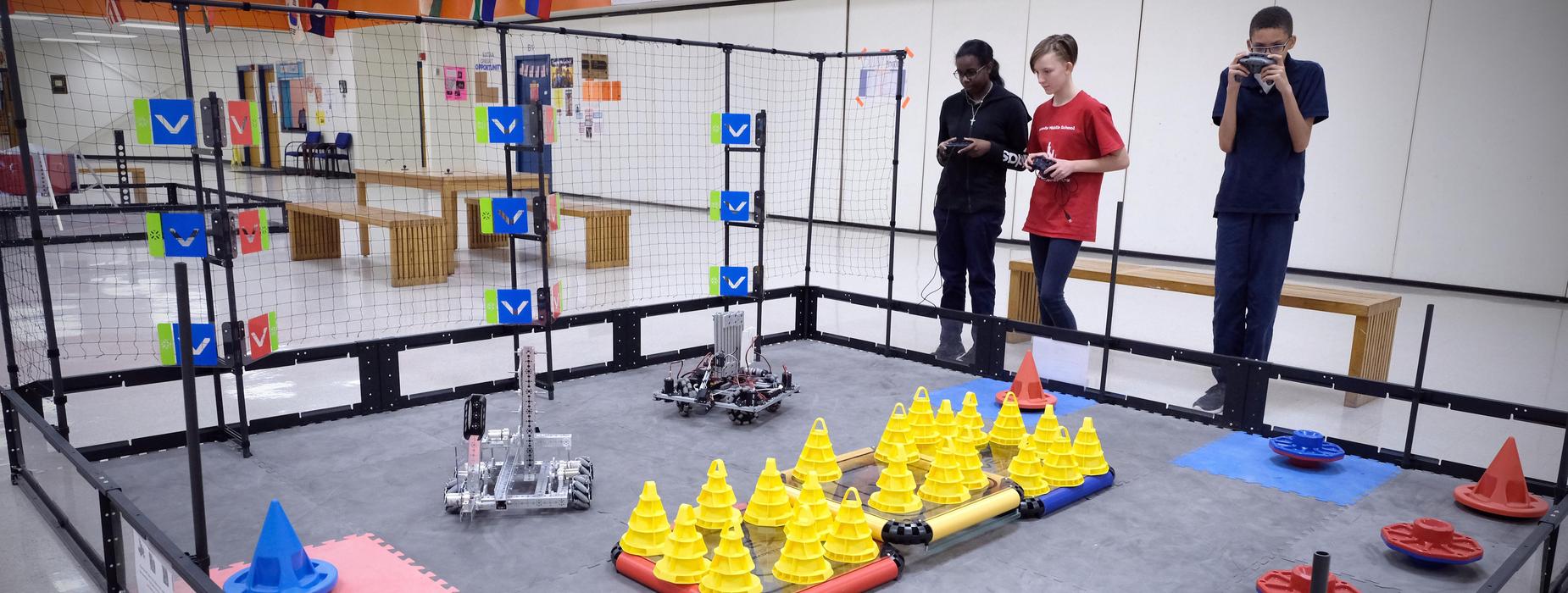 Kids participating in a robotics event