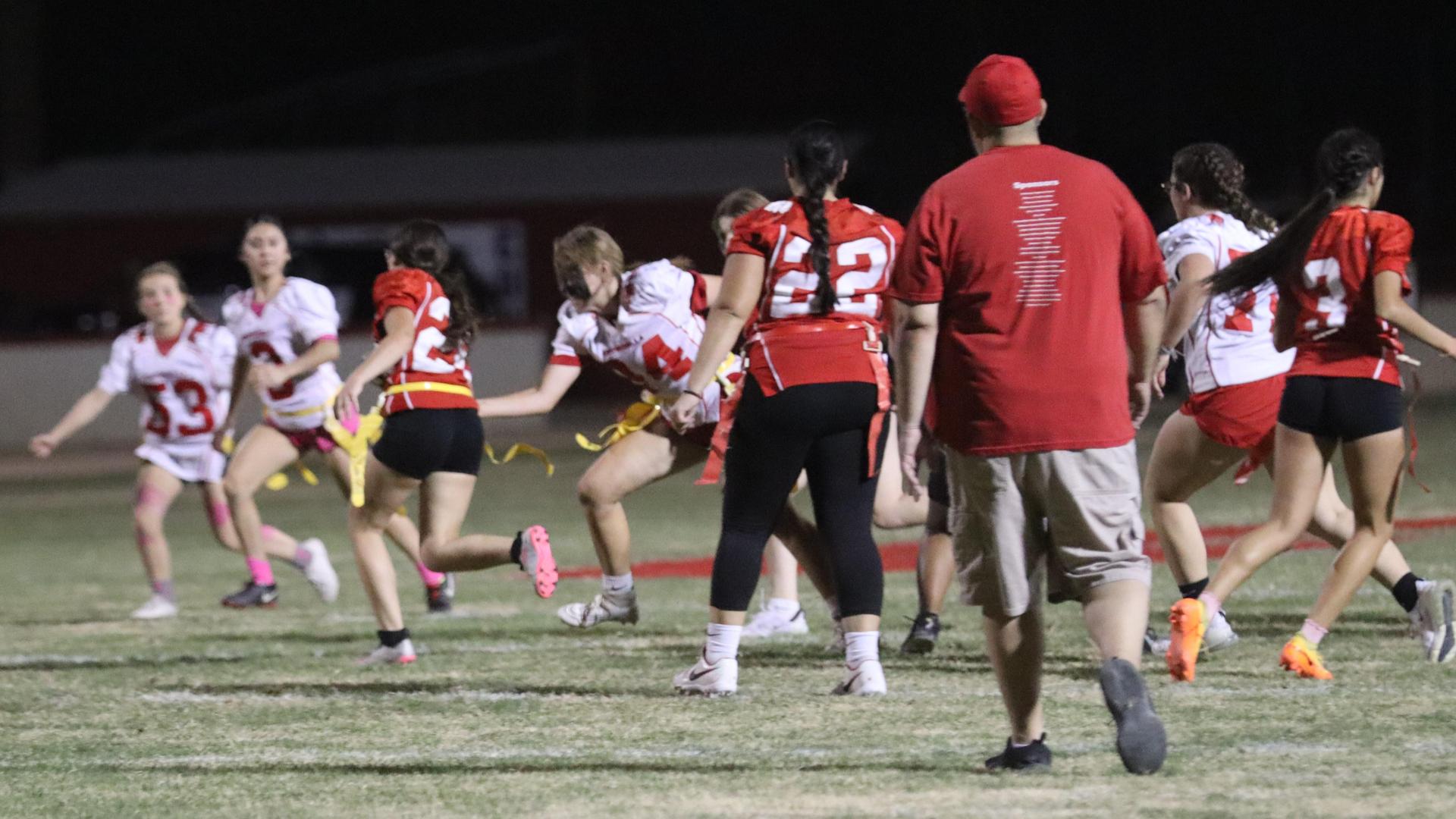 girls playing flag football
