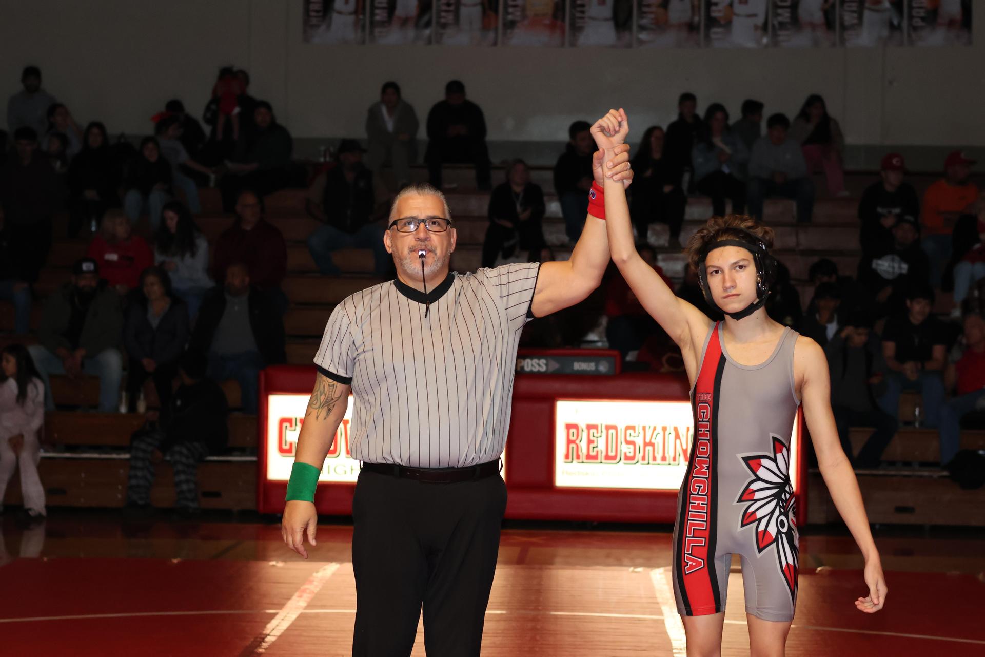 Wrestling winners with hands up 21