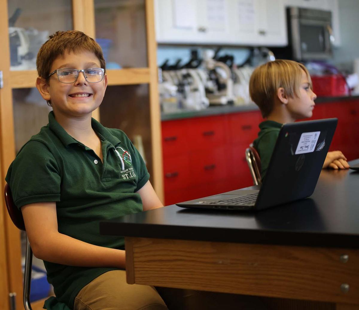 GSA St. Louis Smiley student uses a laptop in class