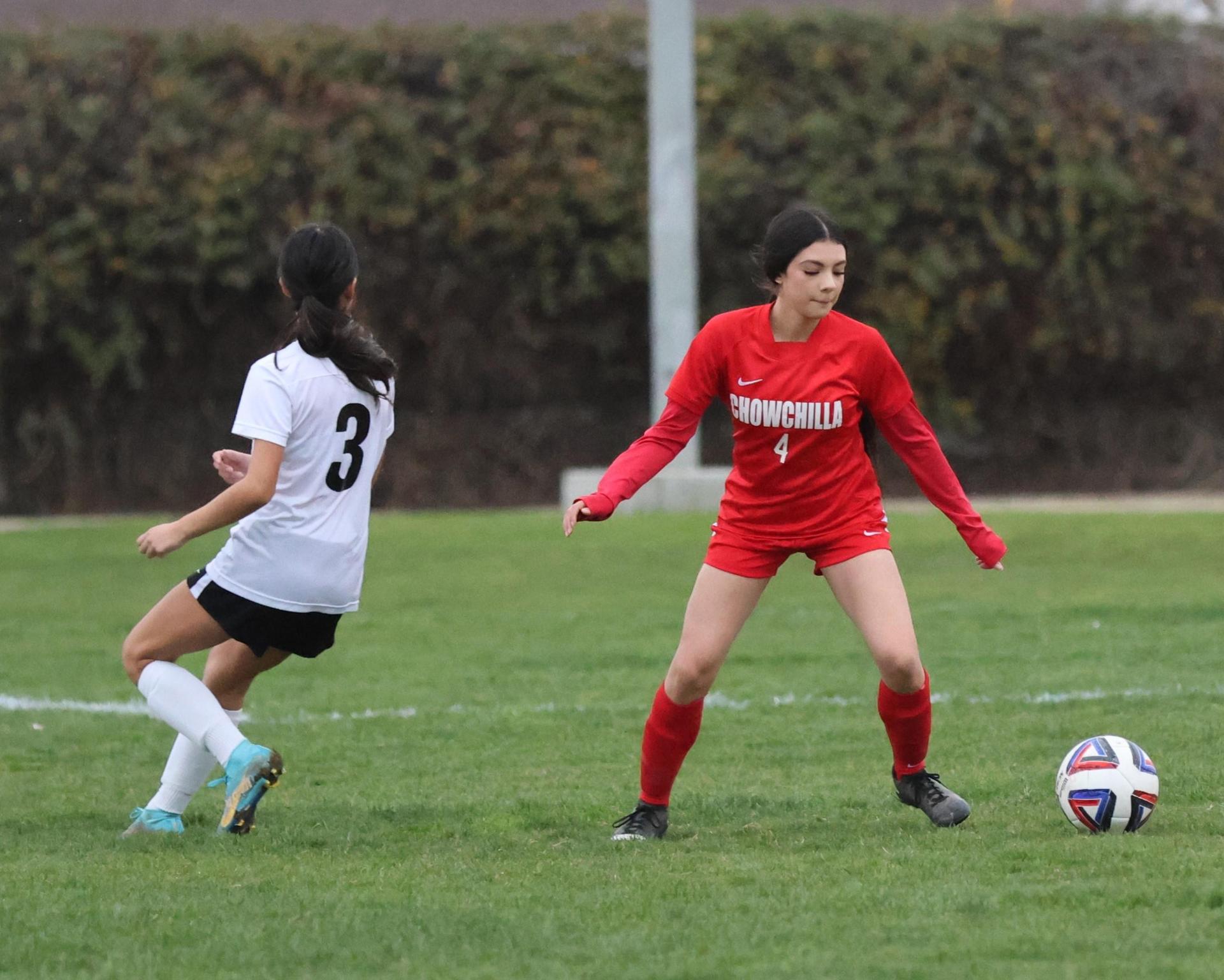 Junior varsity girls playing soccer against liberty