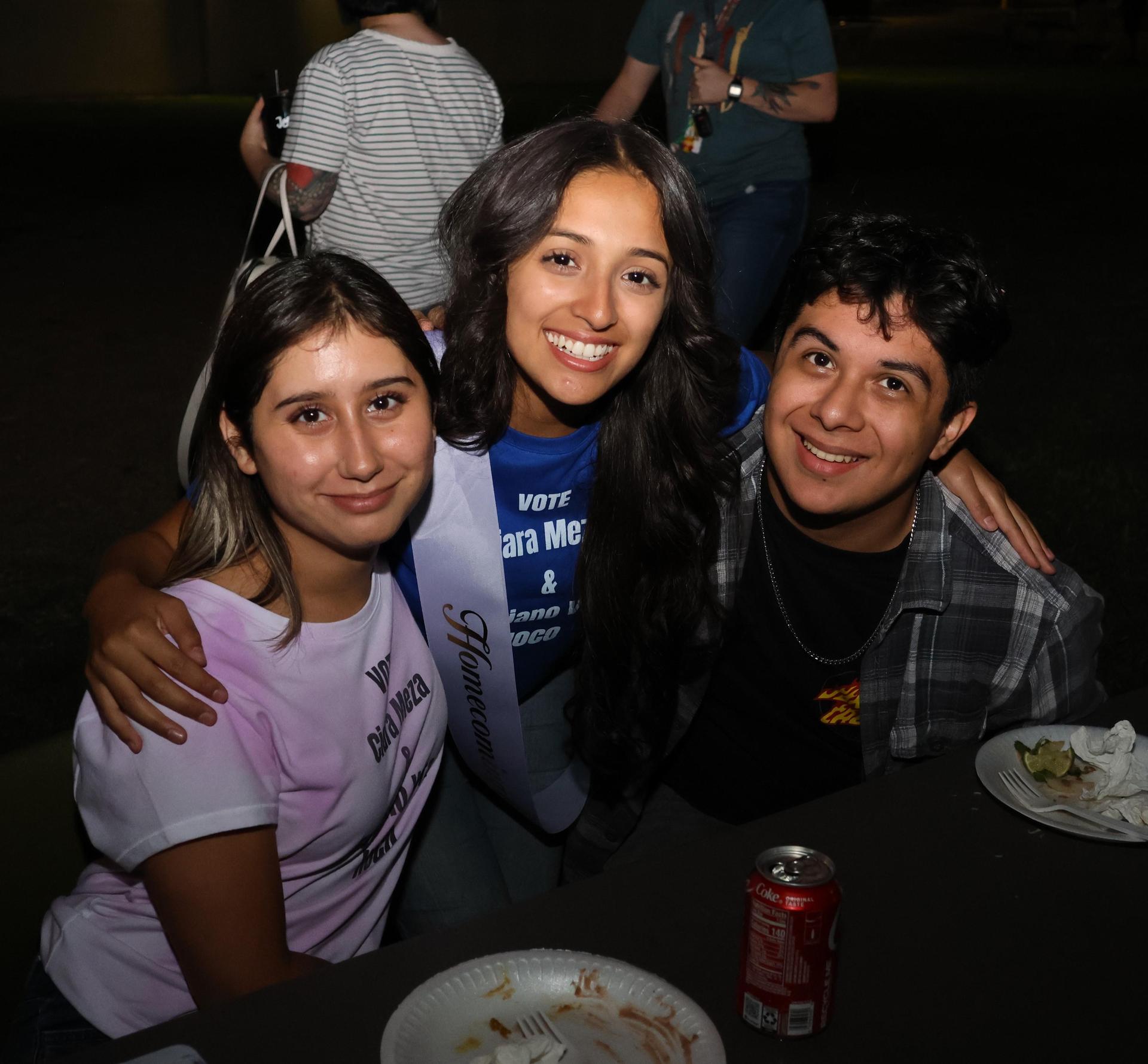 students and staff enjoying the tailgate