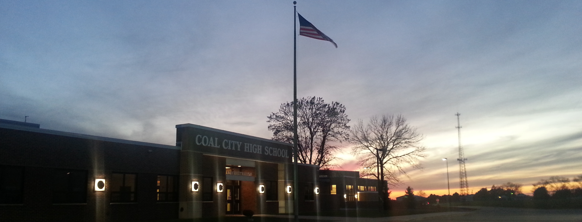 The high school at dusk