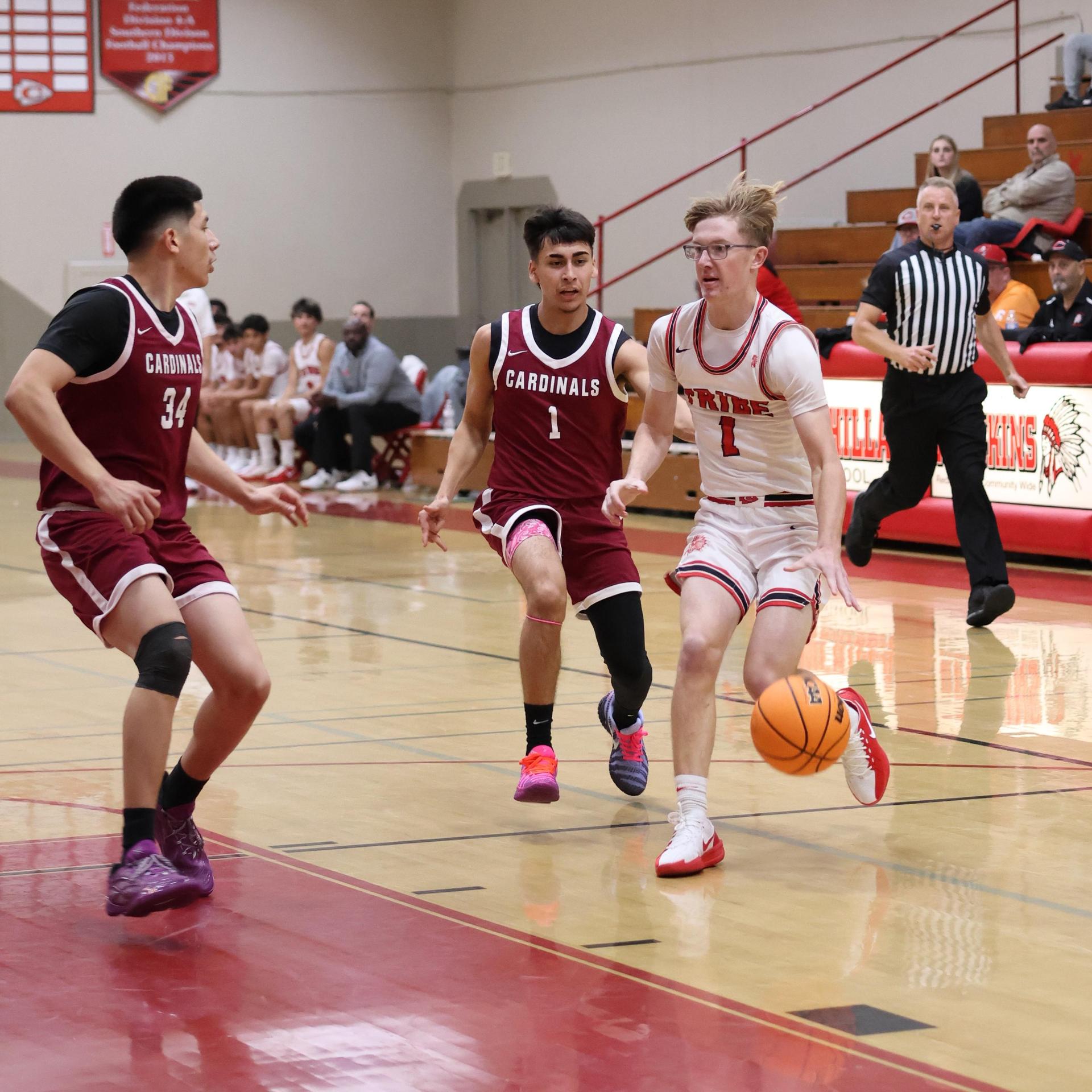 Varsity Boys Basketball playing vs. Orosi 4