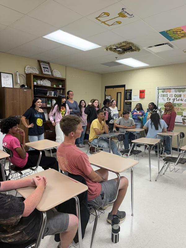 Students listening to Ms. Elzie.