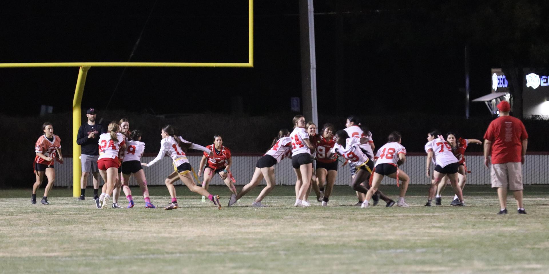 girls playing flag football