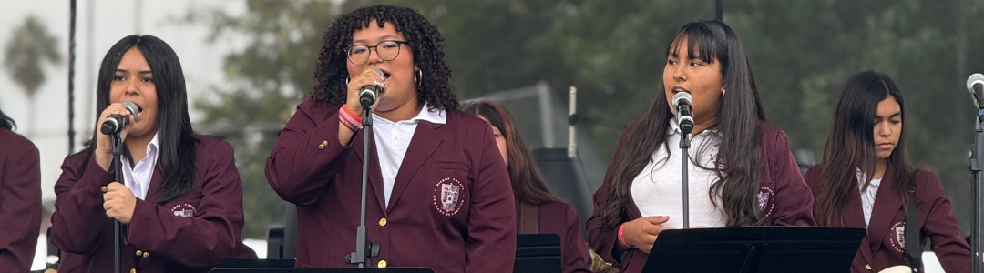 Students sing at Family Fun Day event