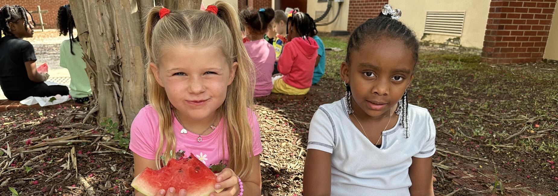 First graders eating Watermelon on the first day of school