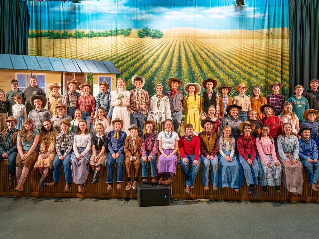 A group photo of the entire cast of "Oklahoma!"