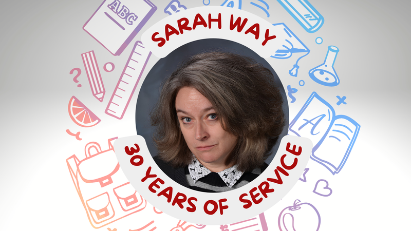 picture of Sarah way congratulating her on reaching 30 years of service