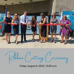 Dr. Smith cutting the ribbon