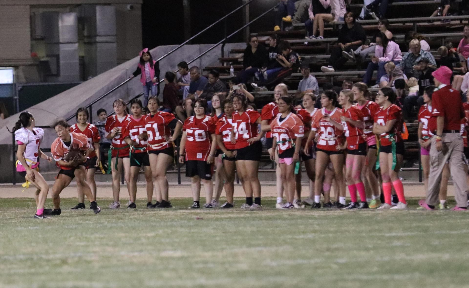girls playing flag football