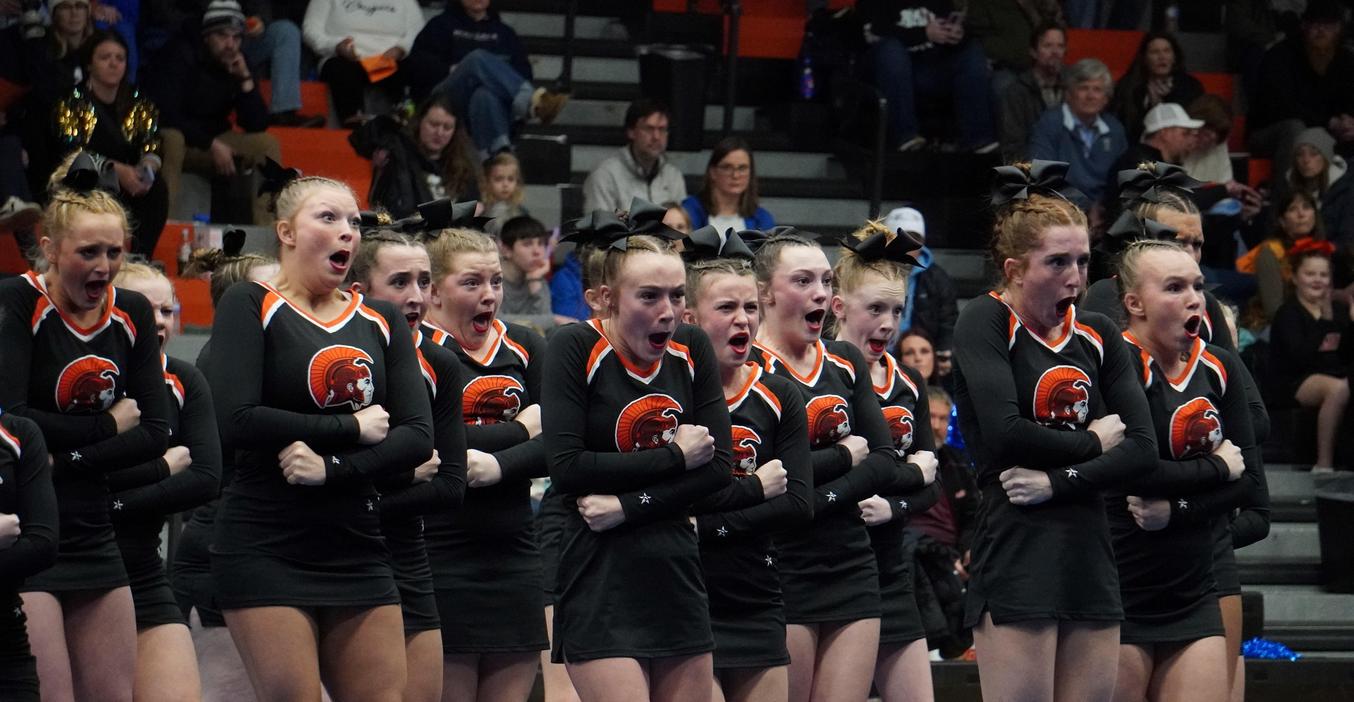 TKHS competitive cheer team performs in their opening round.