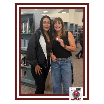Danielle Lahey posing for the camera with her award