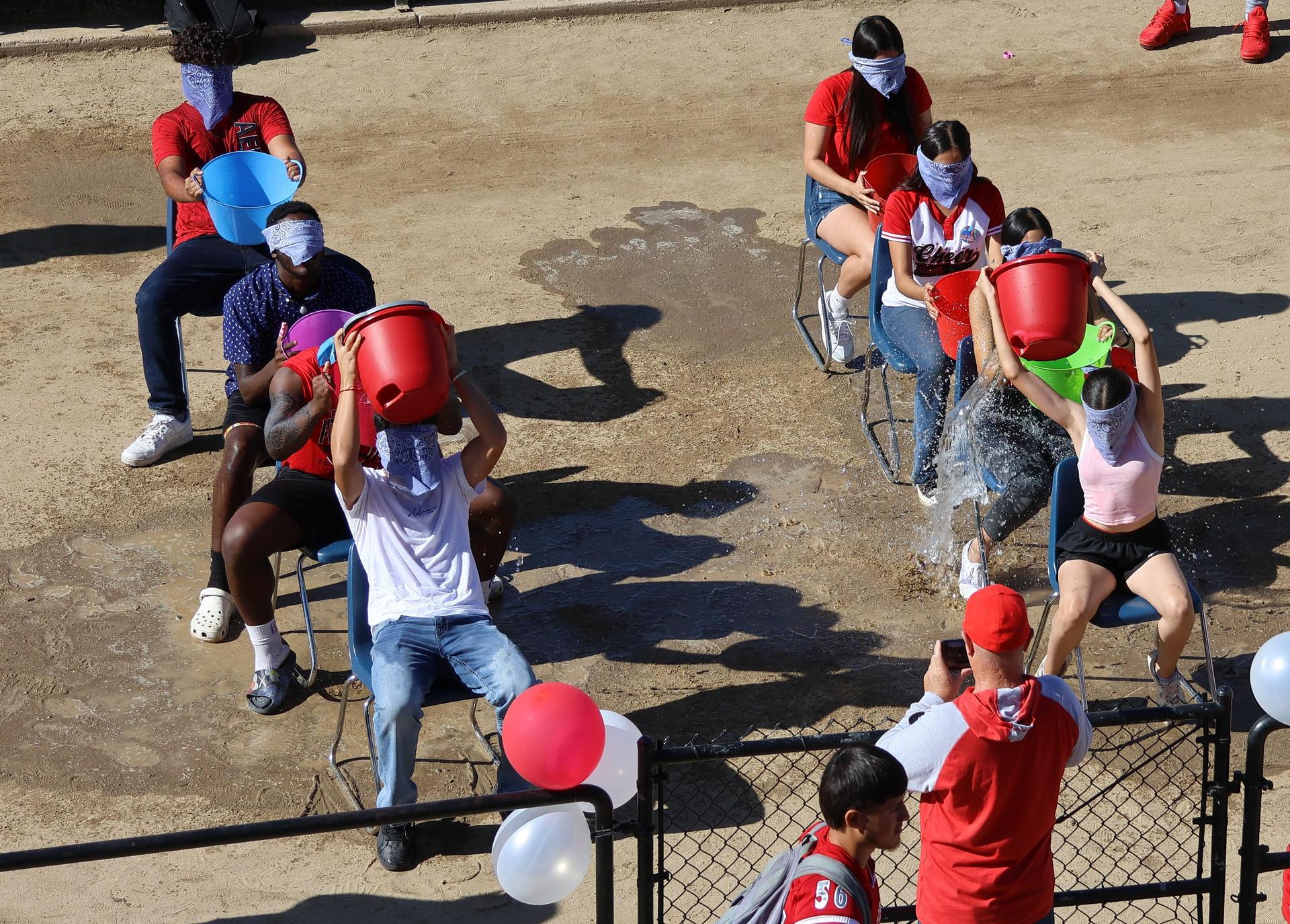 students and staff at the homecoming rally
