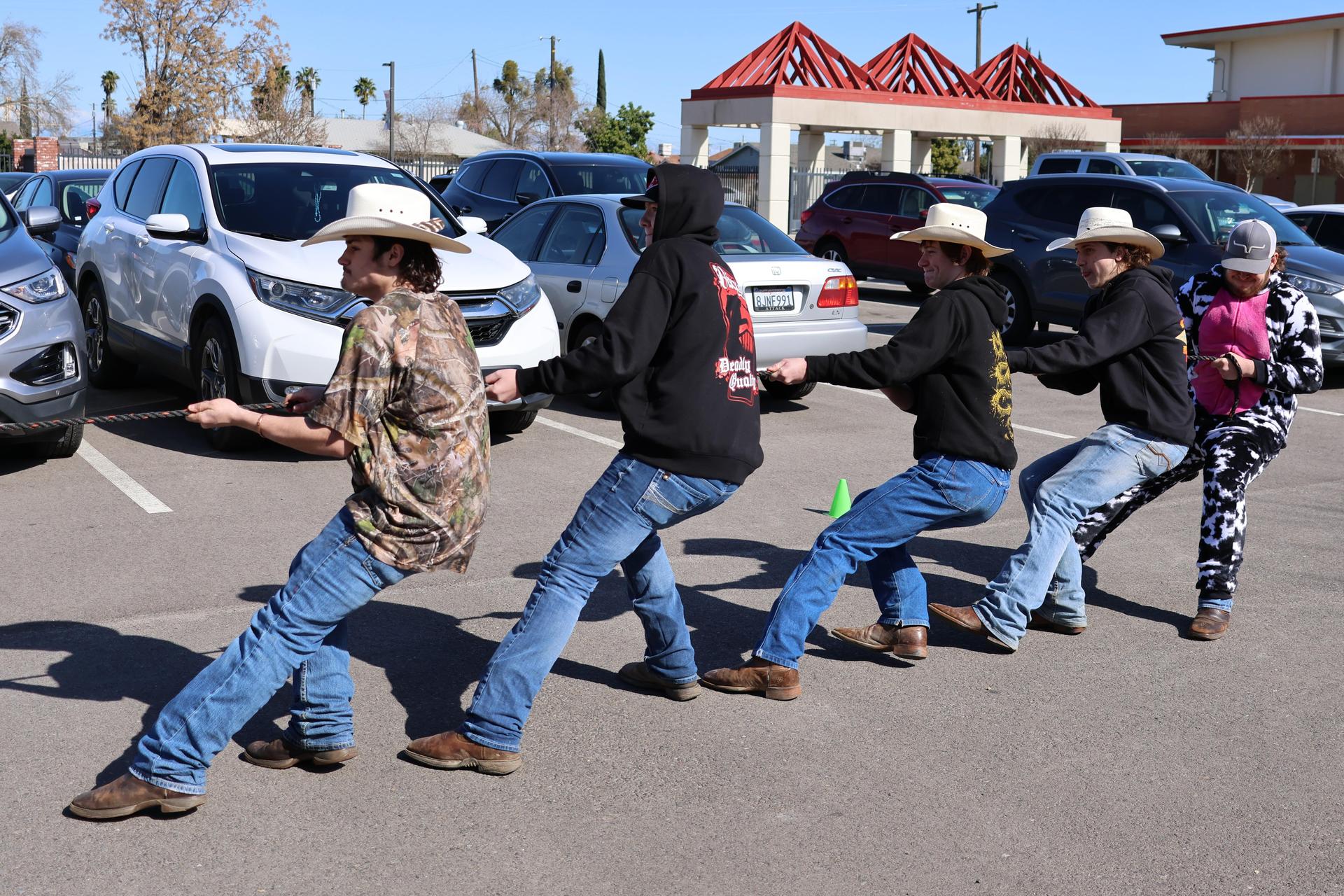 students and staff enjoying the truck pull