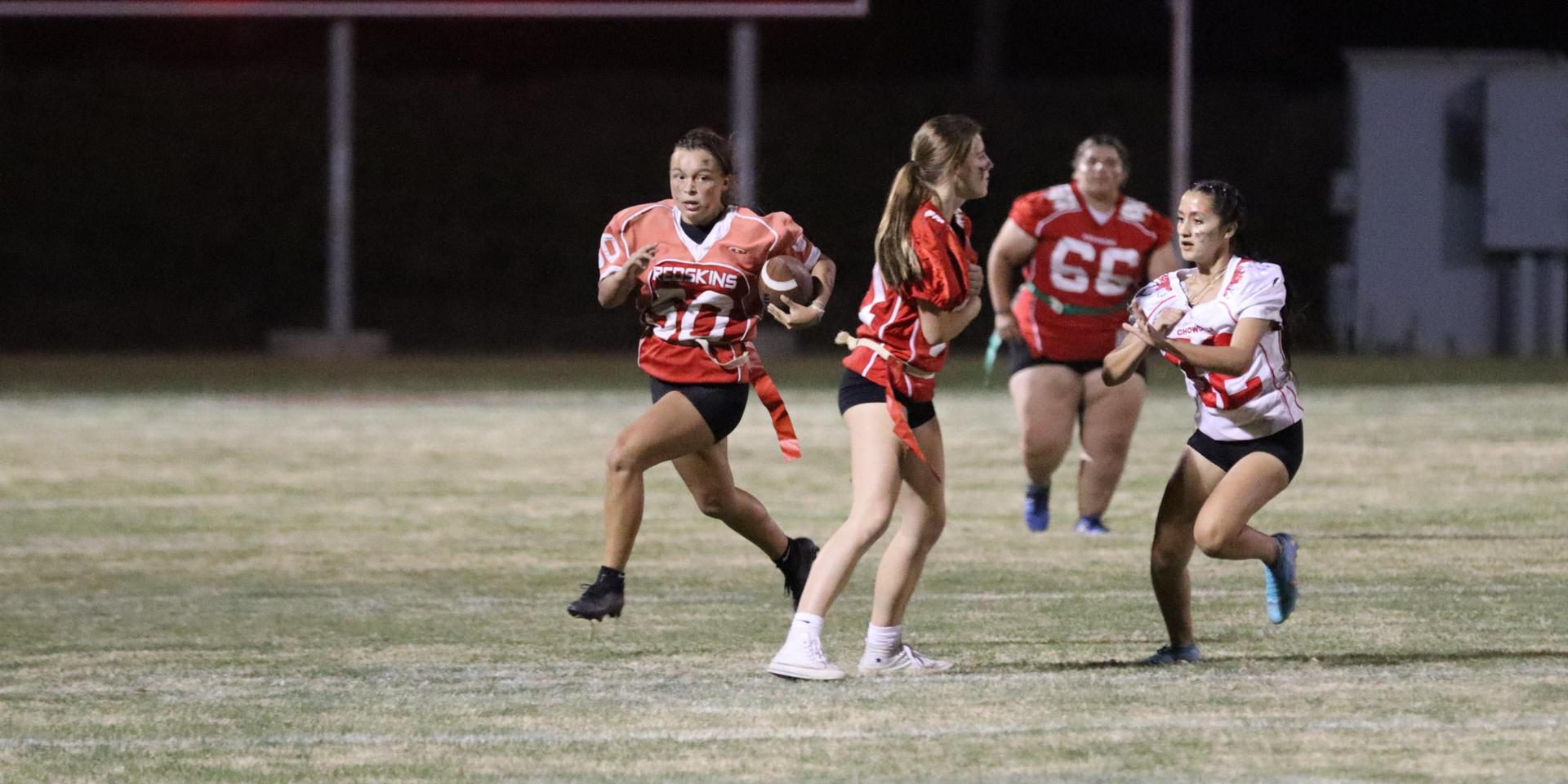 girls playing flag football
