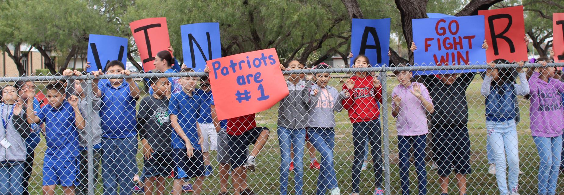students with signs