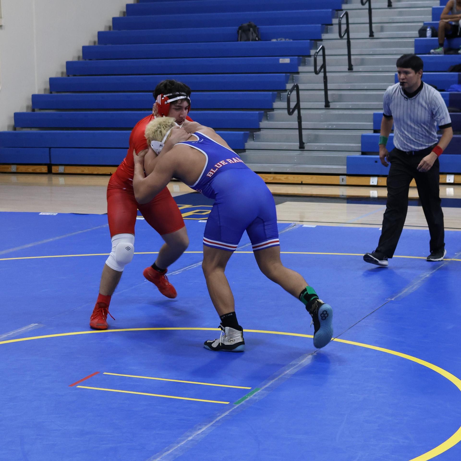 wrestlers in action at parlier
