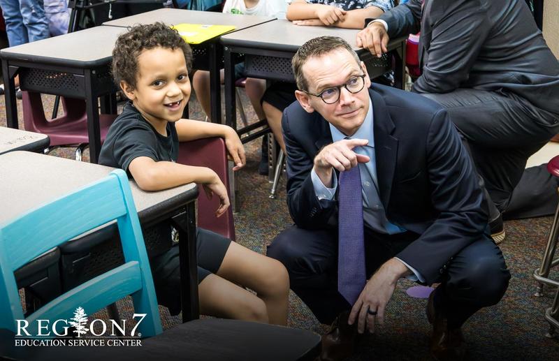 Education Commissioner Morath with Gilmer Elementary student