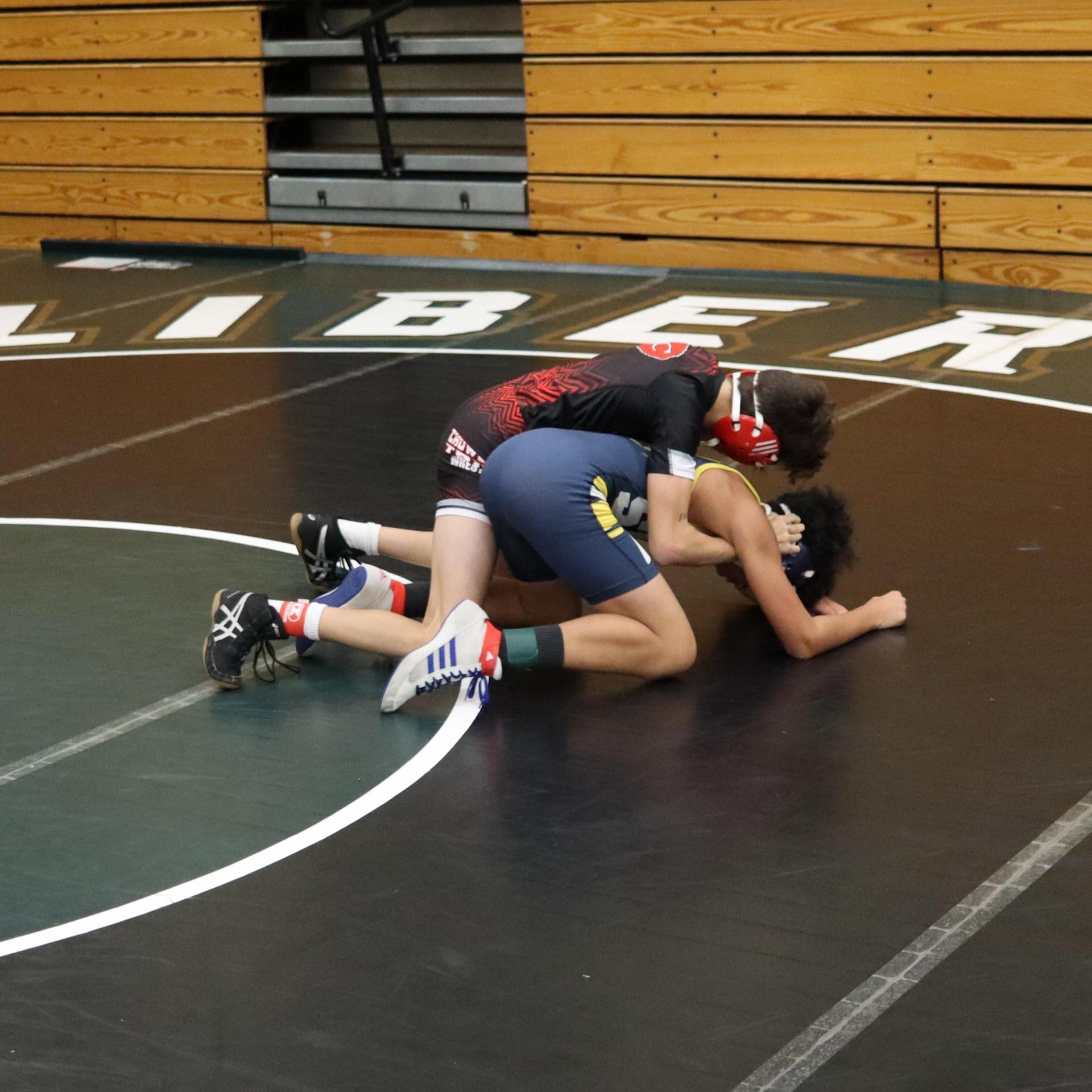 wrestlers in action at the Hawks invitational