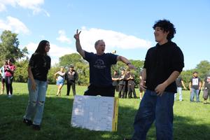 Students compete in rock, paper, scissors.