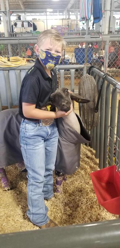 student with his goat