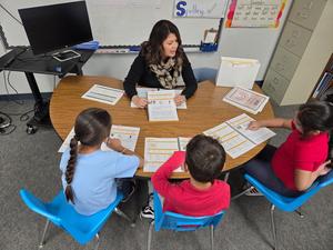 Claudia Barba with a group of Tracy Elementary students.
