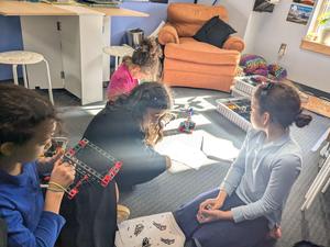 4th grade girls build simple machines.