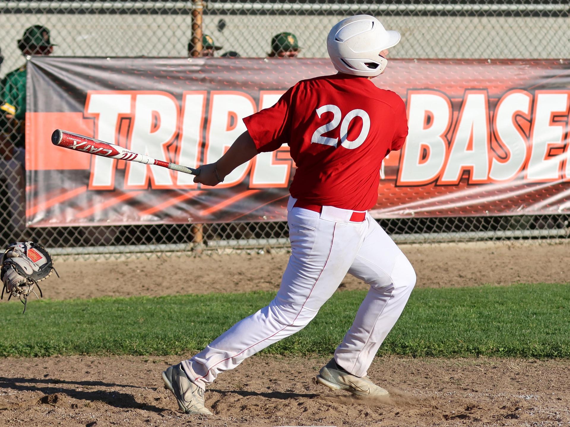 junior varsity baseball players in action