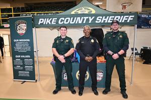 Pike County Sheriff’s Office Deputies Greet Superintendent Dr. Geneva Holmes at Eagles Carnival 2025