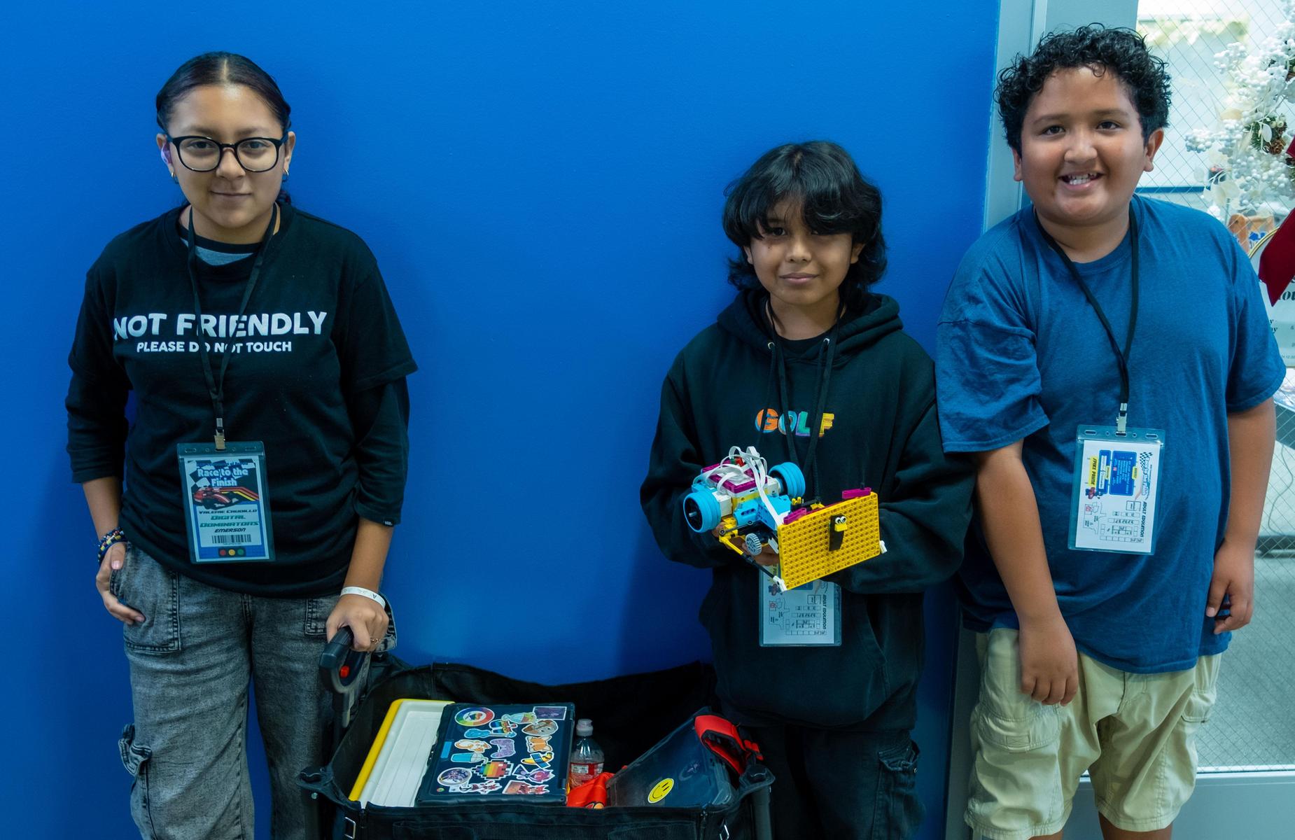 3 students in the hallway right before entering class