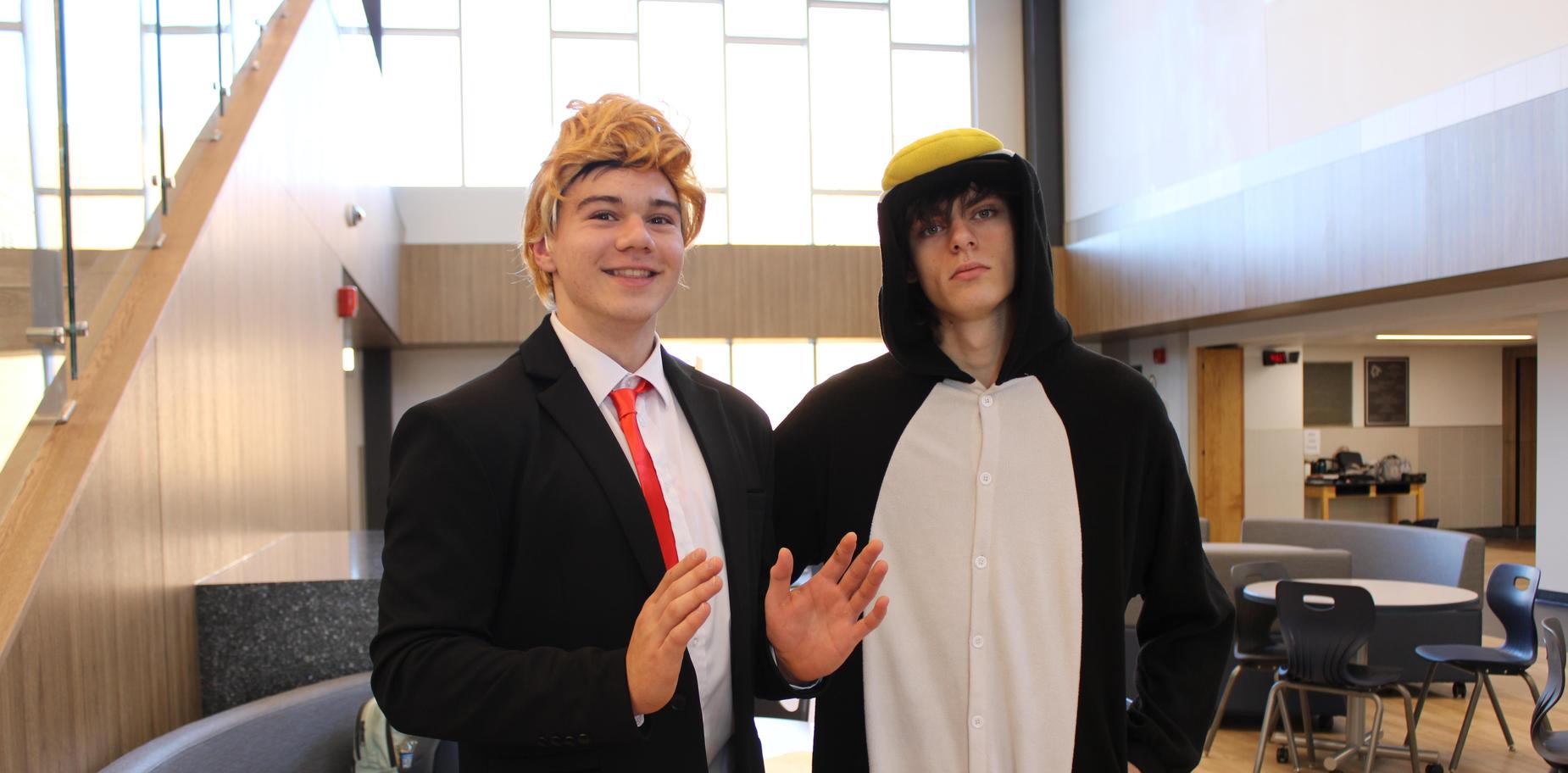 2 students wearing costumes